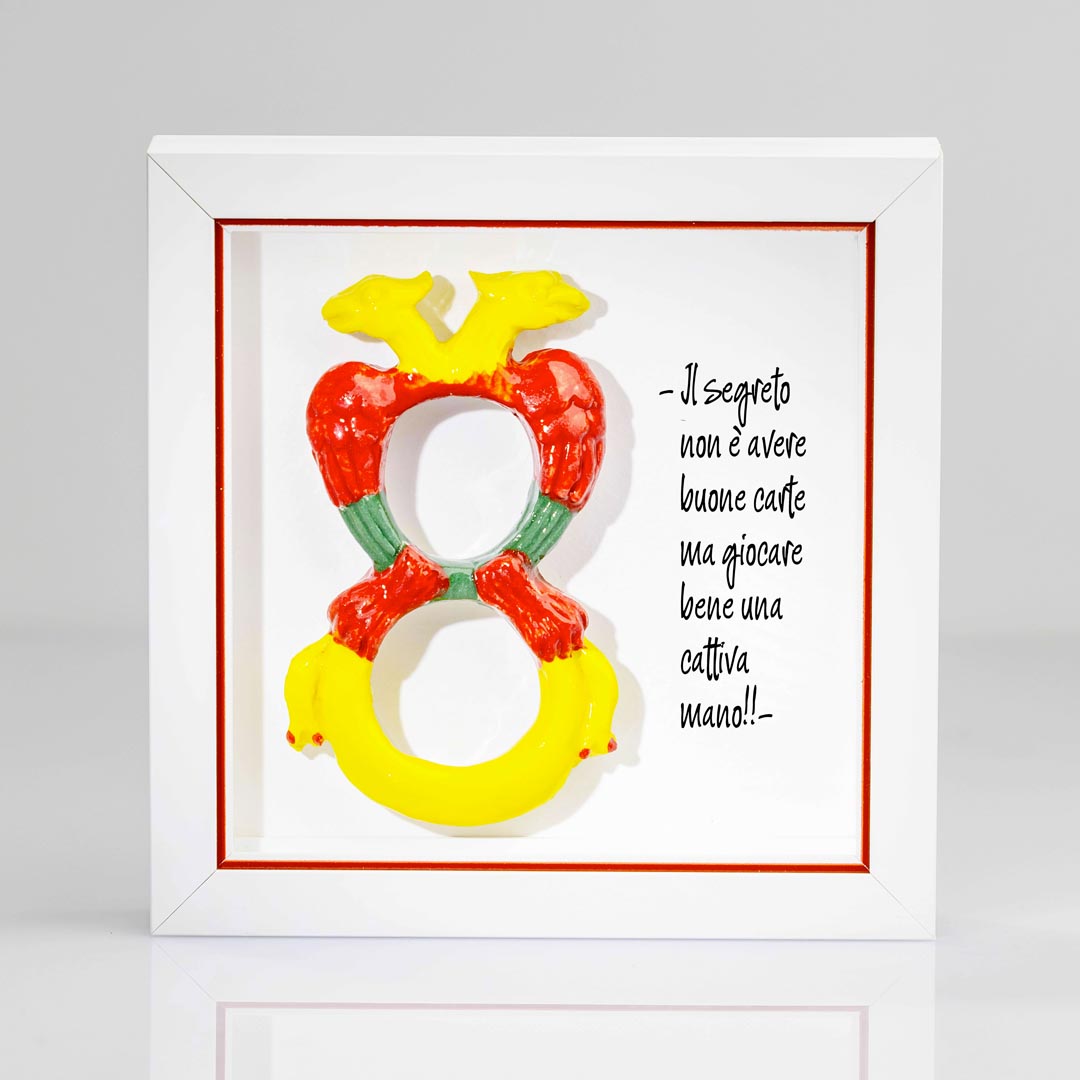 Cornice artigianale con Asso di denari delle carte napoletane e frase decorativa