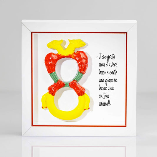 Cornice artigianale con Asso di denari delle carte napoletane e frase decorativa
